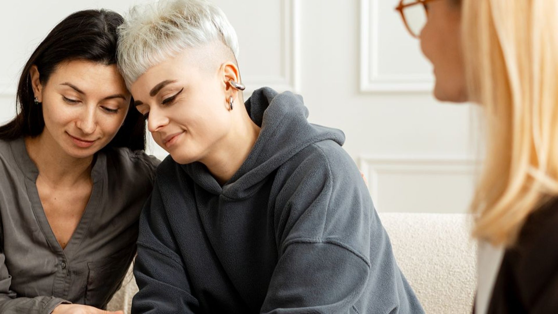 Couple at the therapist's office receiving counseling before marriage.